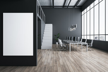 Front view on blank white poster on black wall in open space office with modern computers on light table, wooden floor, stairway and city view background from panoramic window. 3D rendering, mock up