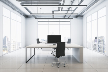 Front view on work place table with modern computer, dark chair on light concrete floor in spacious sunlit office with city view background from panoramic windows. 3D rendering