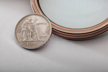 Numismatics. Old collectible coins on the table.