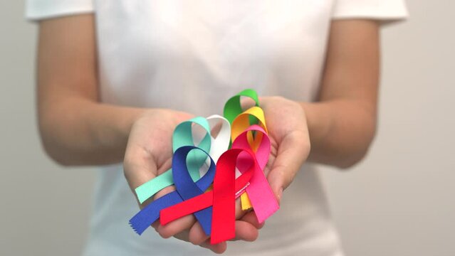 World cancer day, February 4. Colorful ribbons for supporting people living and illness. Healthcare, fighting, medical and National Cancer Survival day, Autism awareness day concept