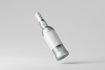 clear glass liquor bottle