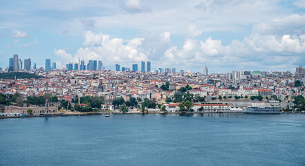 View from the sea to Istanbul. The coastline with boat, old and new houses in the vicinity of the city.