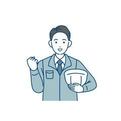 ガッツポーズをする現場監督、建築士の男性