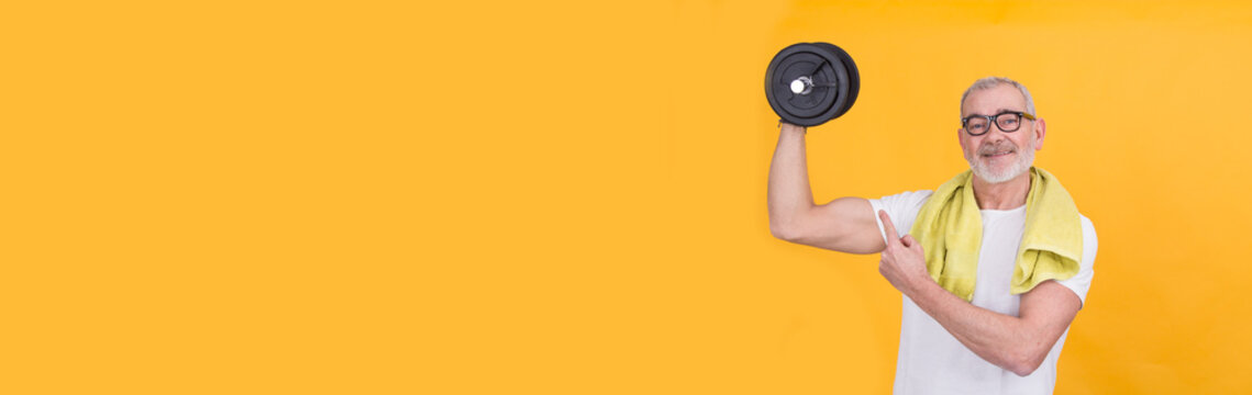 man with dumbbells showing biceps with copy space