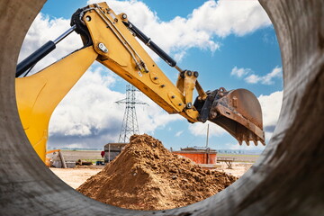 Excavator digs piles. Earthworks for the construction of the foundation. Construction equipment for the device of piles. Preparatory work for grillage.