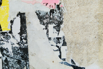 old and torn street poster background with abstract weathered paper texture