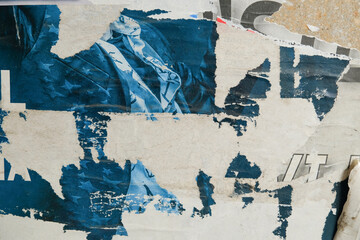 old and torn street poster background with abstract weathered paper texture