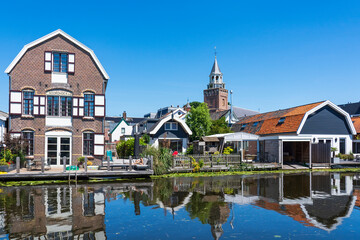 View of some beautiful old buildings along the Oude Rijn in Bodegraven, the Netherlands