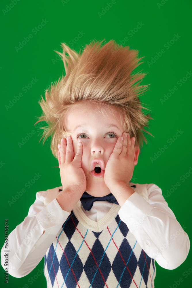 Sticker Surprised child against green chalkboard in class