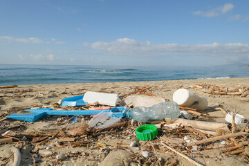 Plastic debris waste pollution trashed on sea coast ecosystem,environment nature contamination