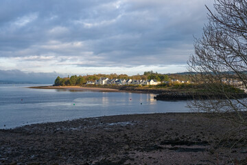 Looking over to the entrance of Kip Marina which fronts the village of Inverkip with the marina village and harbour view in the far distance.