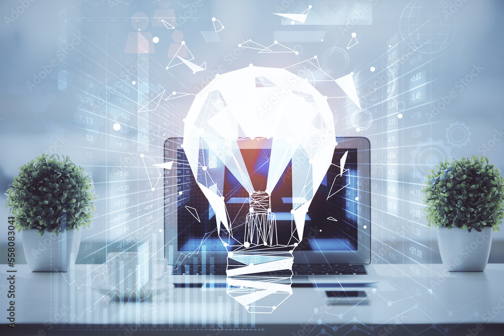 Poster computer on desktop in office with bulb icon hologram. double exposure. concept of idea.