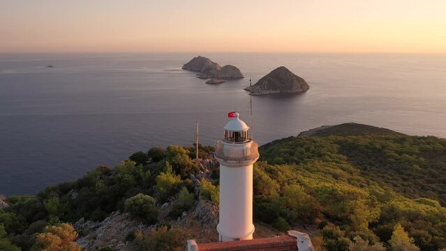 Aerial View of Lighthouse Tower, Scenic Coastline on Mediterranean Sea at Sunset