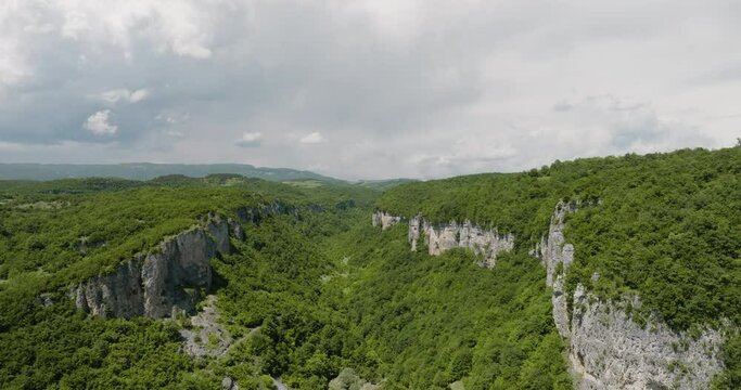Great wooded canyon rift in green woodland landscape in Georgia.