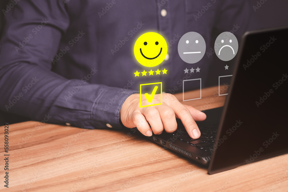 Poster man hand using computer laptop with popup five star icon for feedback review satisfaction service, t