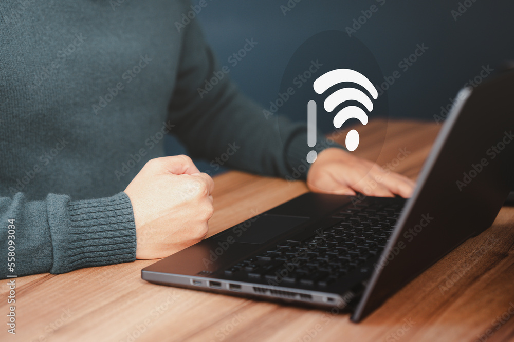 Poster Man using a computer laptop to connect to wifi but wifi not connected, and waiting to loading digital business data form website, concept technology of waiting for connect to wifi.