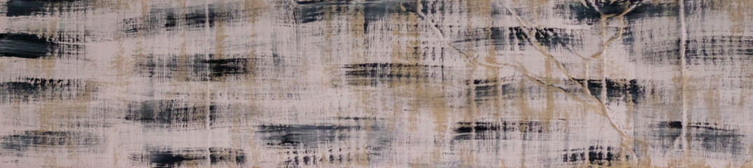Beige panorama with black strokes of acrylic paint. Banner, abstract drawing on old cardboard.