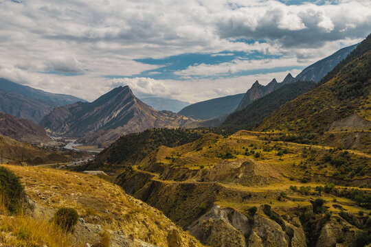 Changeable Weather In The Caucasus Mountains. Panoramic View.