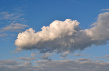 Isolated White Cloud seen against Blue Sky 