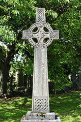 Ornate Stone Celtic Cross in Deserted Graveyard
