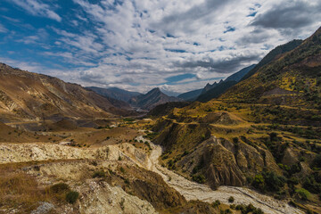 Changeable weather in the Caucasus Mountains. Panoramic view.