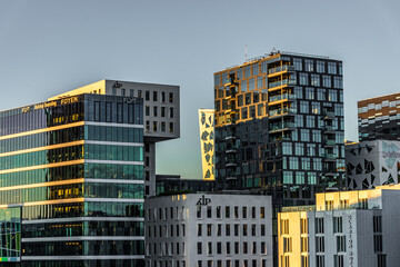 Modern architecture in Oslo business district at sunset