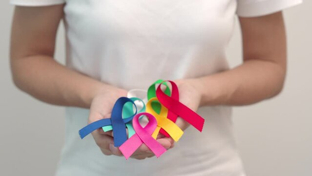 World cancer day, February 4. Colorful ribbons for supporting people living and illness. Healthcare, fighting, medical and National Cancer Survival day, Autism awareness day concept