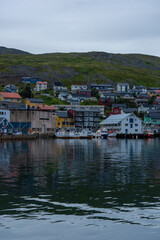 Fototapeta na wymiar Honningsvag, Norway, 13 August 2022 : The harbor of Honningsvag, considered the northernmost town in the world, a few kilometers down North Cape