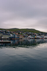 Honningsvag, Norway, 13 August 2022 : The harbor of Honningsvag, considered the northernmost town in the world, a few kilometers down North Cape