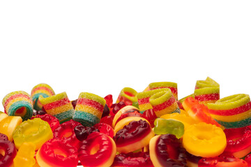 Assorted colorful gummy candies. Top view. Jelly donuts. Jelly bears. Isolated on a white background.