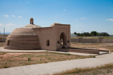An old stone building for storing water on the road to Bukhara, in Uzbekistan.