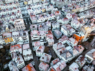 Bergen Roofs Covered with Snow. Aerial View. Traditional Scandinavian Architecture of the Old Town of Bergen. Bergen, Vestland, Norway. 
