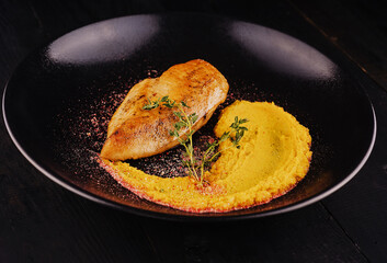 Chicken breast steak with carrot puree