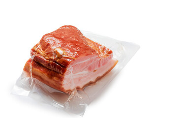 Traditional smoked pork ham on white background. Classic meat product ready to eat with layers of meat and fat and delicate flavor. Polish and East European popular meal.