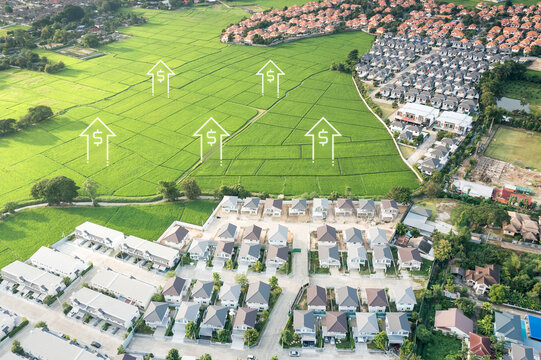 Land value in aerial view consist of landscape, green field or agriculture farm, house or residential building in village, arrow of rate market price. Real estate or property in Chiang Mai, Thailand.
