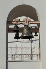Obraz premium Big bells on a white wall
