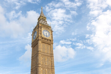 Fototapeta na wymiar Elizabeth tower the popular Big Ben the largest clock tower in the world with a belfry, a landmark of London, England, low angle shot.