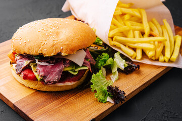 burger with jerky meat with fries