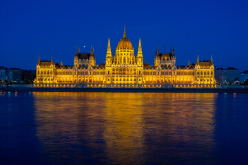 Fototapeta na wymiar Scenery after sunset of the Hungarian Parliament Building, the symbol of Budapest