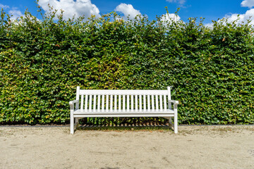 a white bench in the park