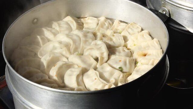 Vegetarian traditional dumpling momos. Tibetan momo Street food in Kullu Manali Himachal Pradesh India.