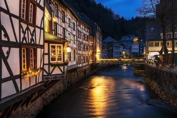 City Monschau in Region national park Eifel with river Rur in the evening with old houses