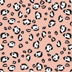 Spot panther fur color. Seamless vector pattern with hand drawn illustration with animal print
