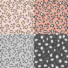 A set of vector seamless patterns with cheetah spots hand drawn illustrations
