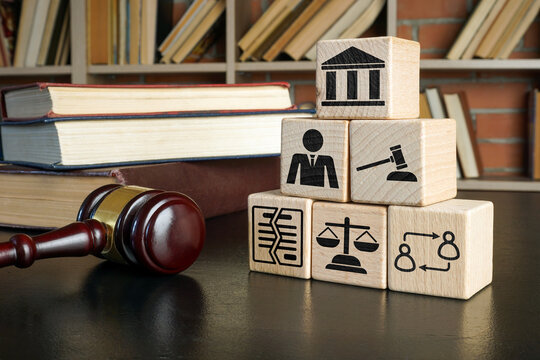 Cubes with signs and gavel. Contract law concept.