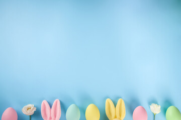Easter bunnies and eggs wide background