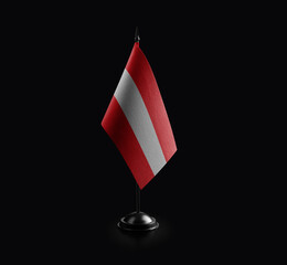 Small national flag of the Austria on a black background