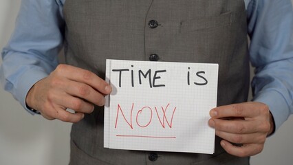 Business man with write Don't worry be happy , Time is now ( carpe diem ) - positive message and lifestyle 