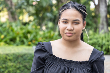 upset unhappy young African woman staring at you