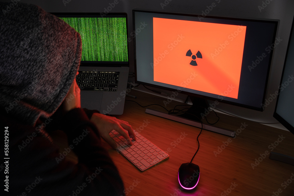 Poster an anonymous male hacker use his skills to hack systems, personal data and money.cyber crime concept